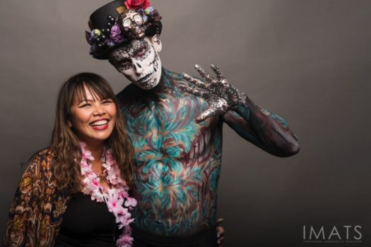Amazing body painting artist Mona Turnbull with model, colourful skeleton theme at the iver makeup academy